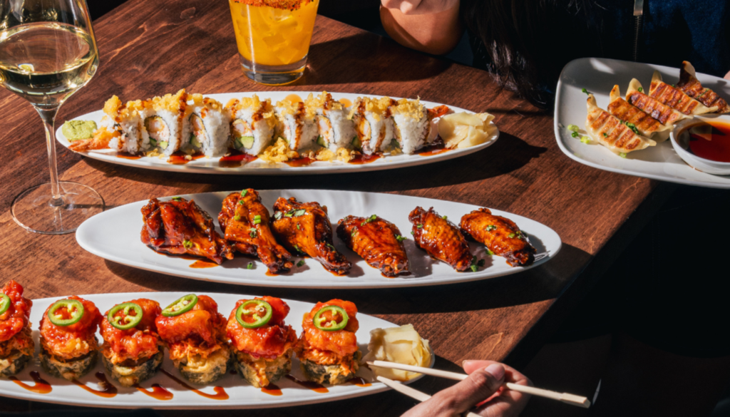 Plates of food and drinks on a table