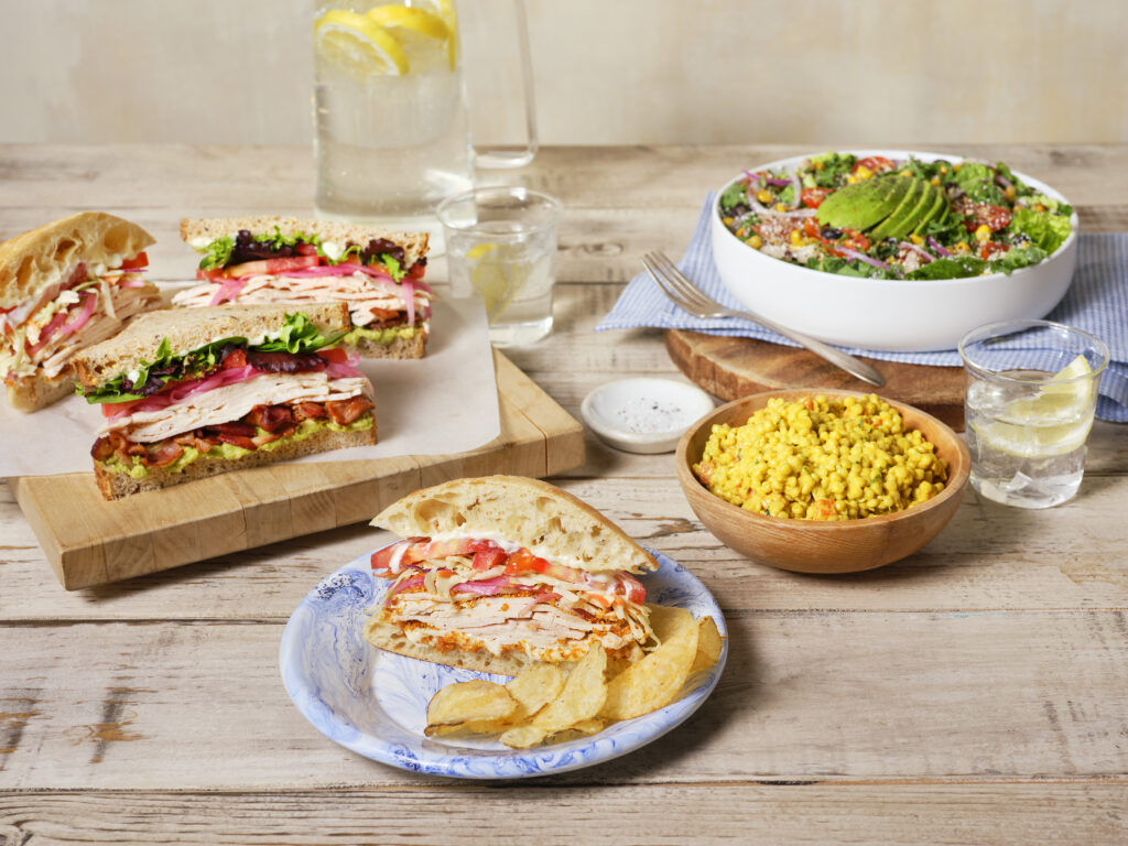 Assorted sandwiches, salads, and sides