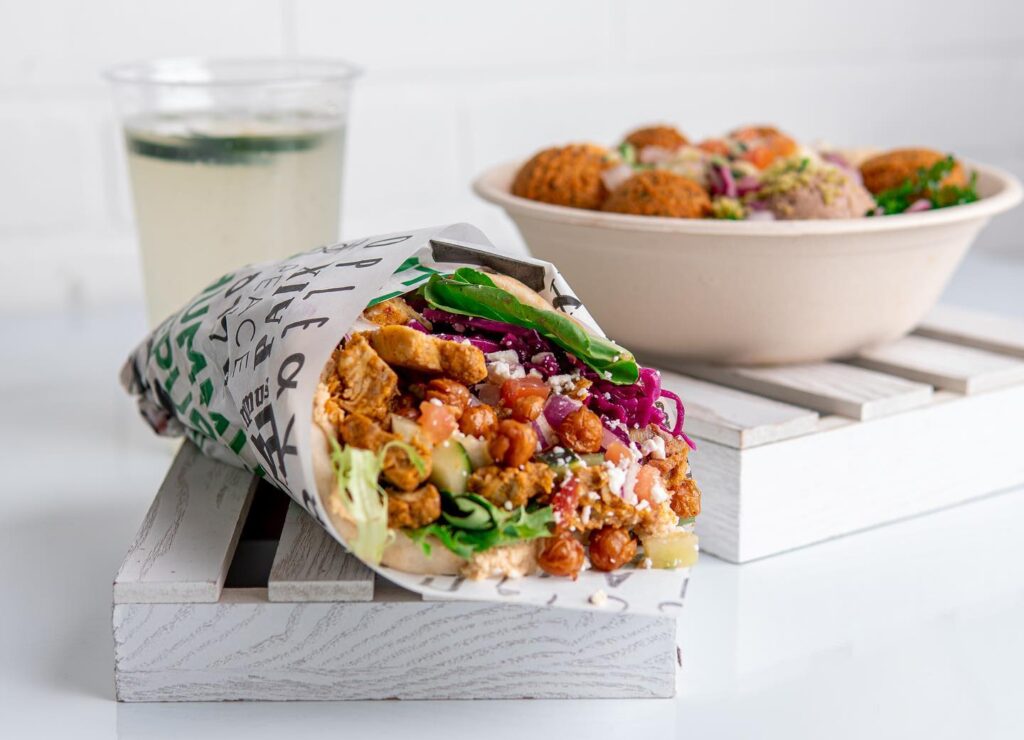A pita, a bowl, and a drink